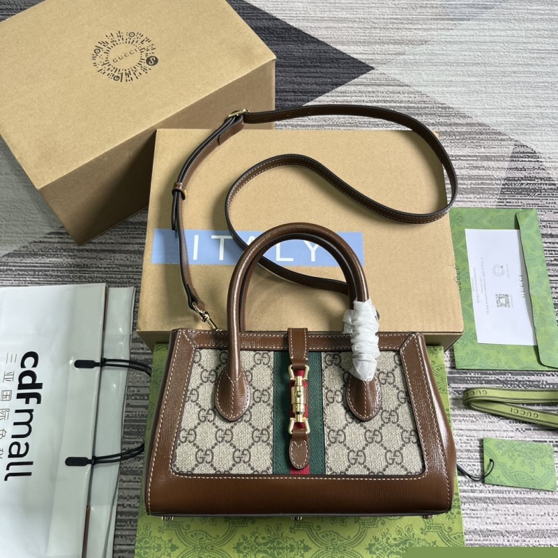 G*u*i top handle bags